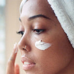Papaya Face Mask being applied on womans skin
