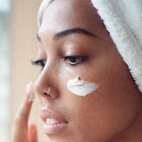 Papaya Face Mask being applied on womans skin